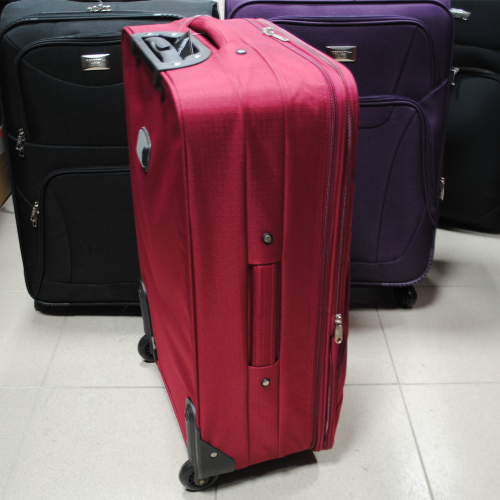 Куфар на колелца среден 64см./40см.26см. платнен червен с допълнителни джобове