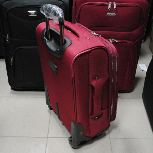 Куфар на колелца малък 55см./37см./26см. платнен червен с допълнителни джобове