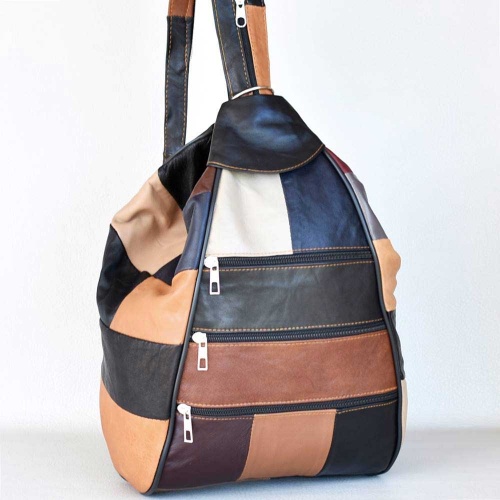 Дамска раница-чанта от естествена кожа с много външни джобчета, тъмни пастелни цветове