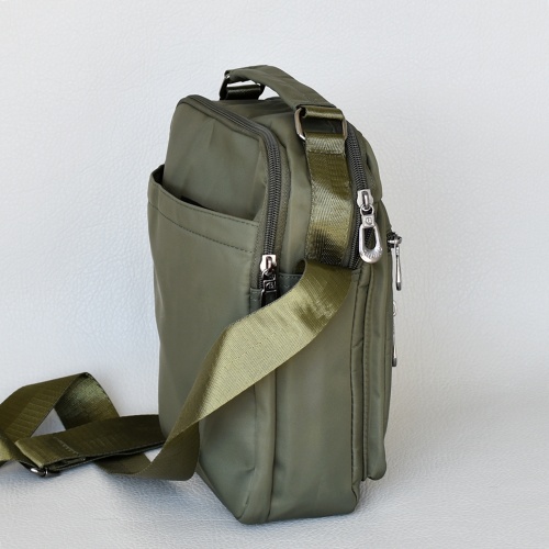 Мъжка чанта от плат за в ръка и през рамо подходяща за носене на пистолет зелена