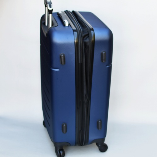 Куфар с колелца от ABS твърд голям с релефно оребряване четири колелца 76/50/30 см