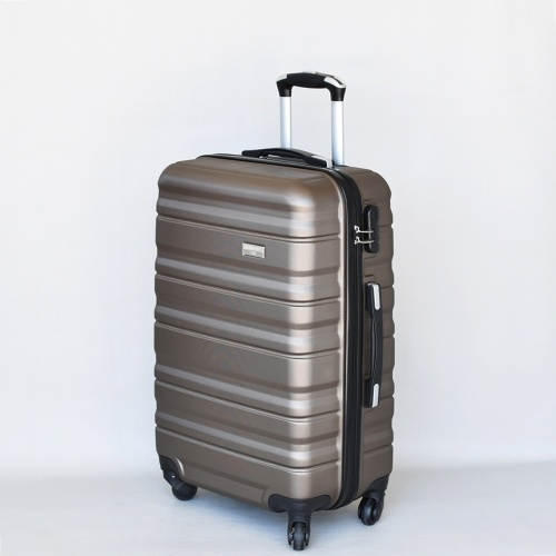 Куфар с колелца от ABS твърд среден с релефно оребряване четири колелца 65/41/25 см
